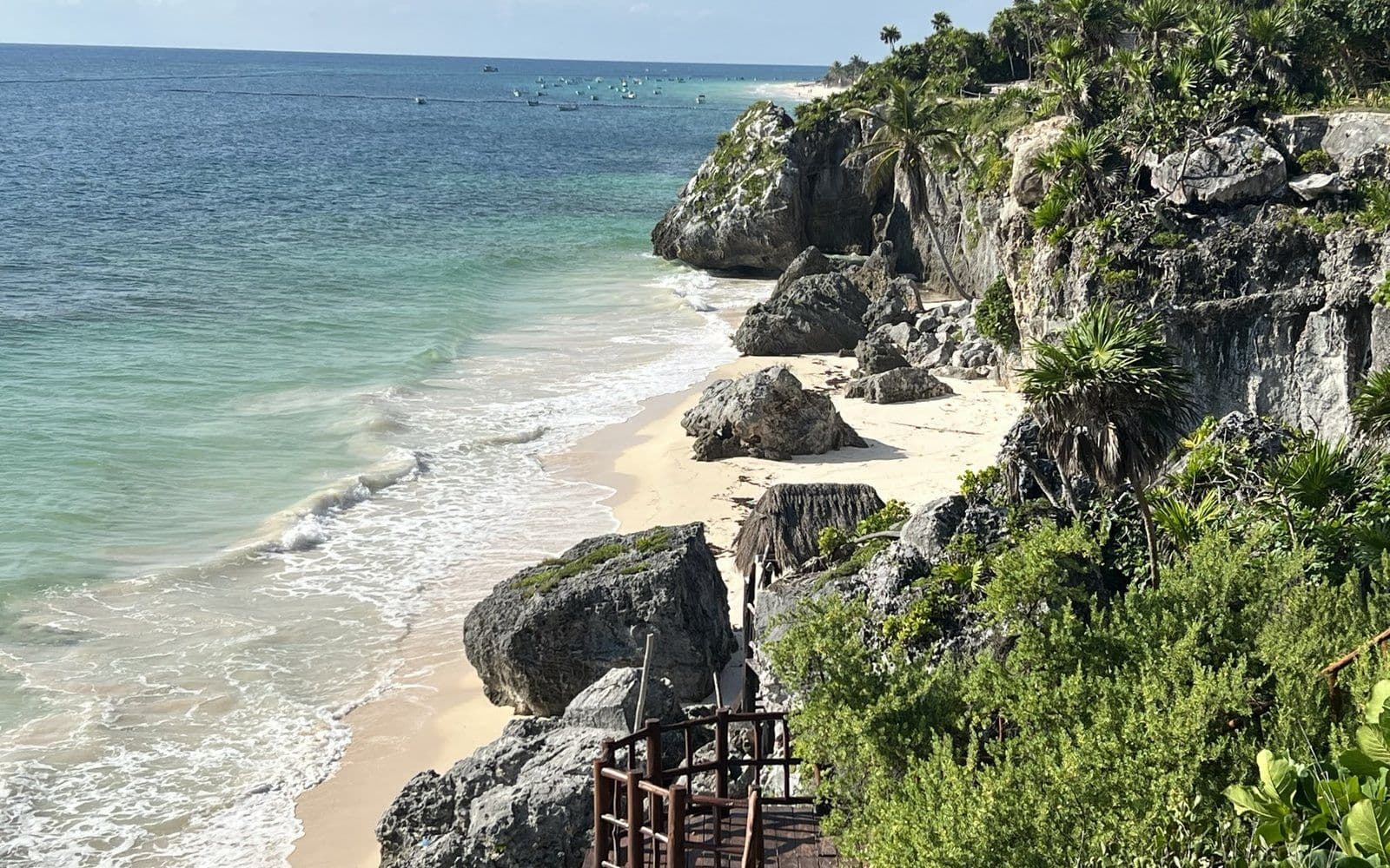 Tulum ruins above a turquoise Caribbean cove